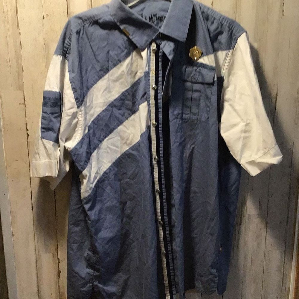 Crowne￼ Holder shirt size XL fade small spots shown